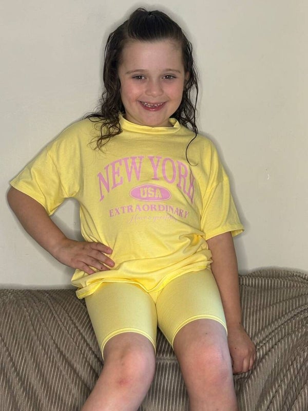 Yellow New York shorts and T-Shirt