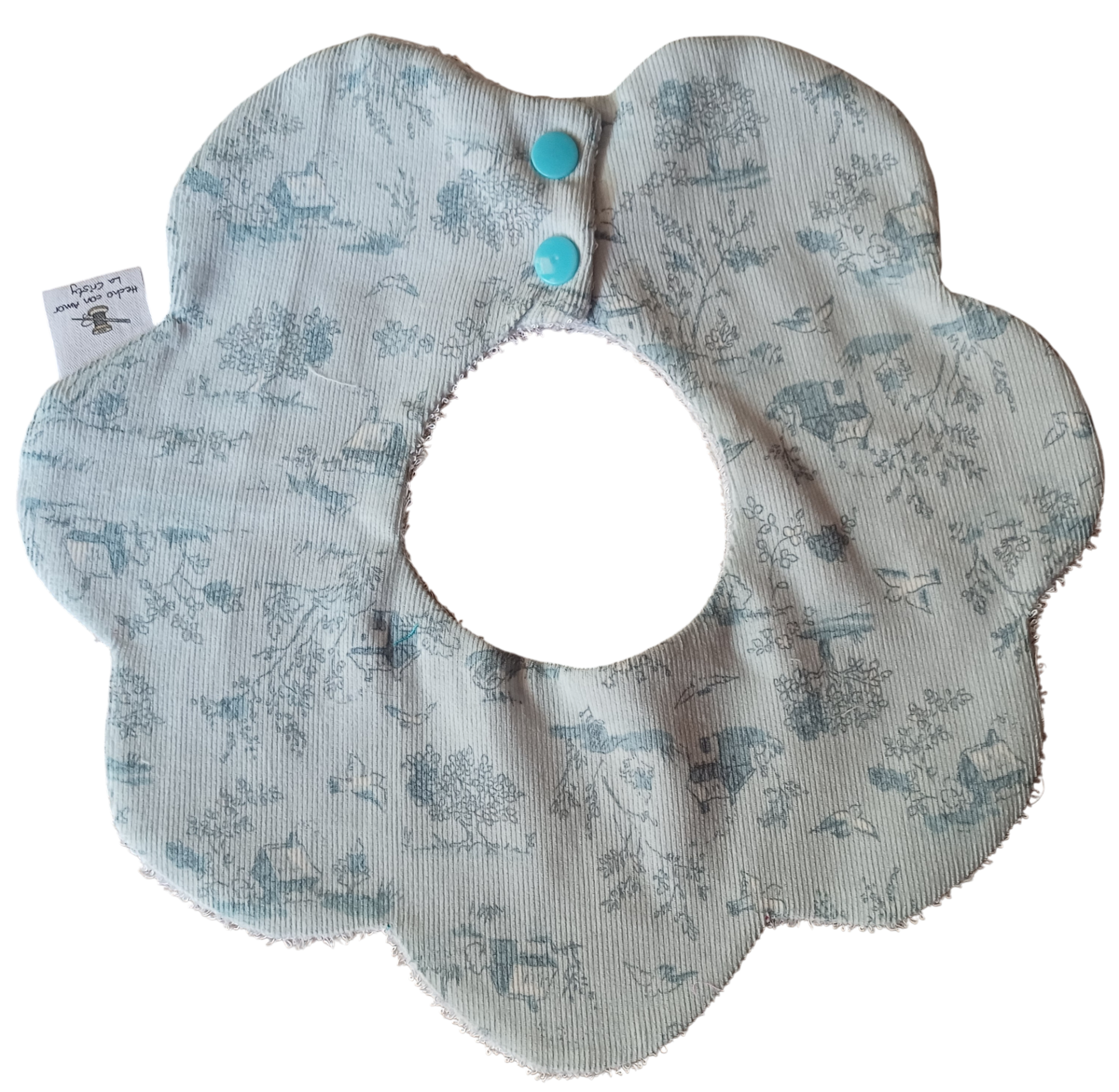 BABERO FLOR CASITAS AZULES