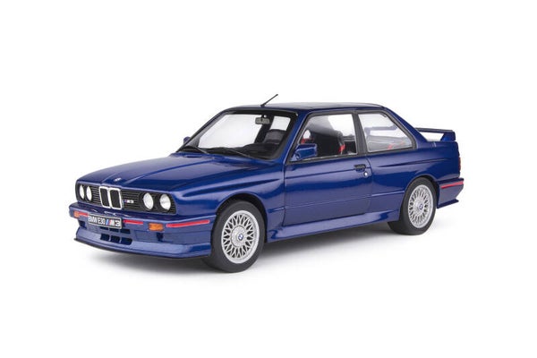 BMW E30 M3 - 1/18 SOLIDO INCL. 200 PAG BOEK