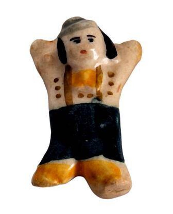 Fève - Homme couché