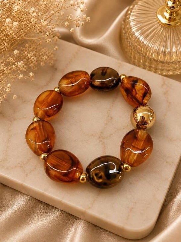Bracelet résine et acier ton marron transparent