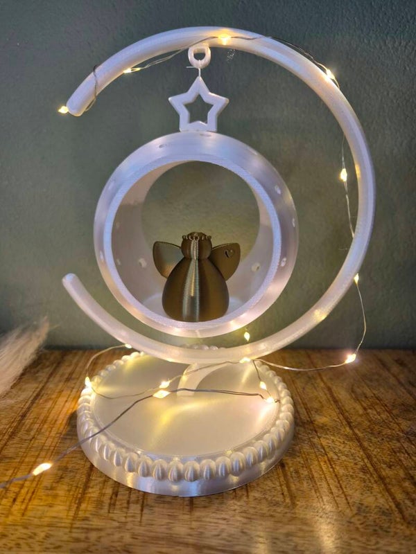 Bol in hanger met engel