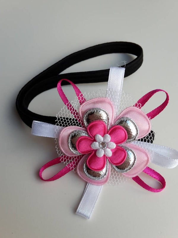Elastieken haarband met bloem