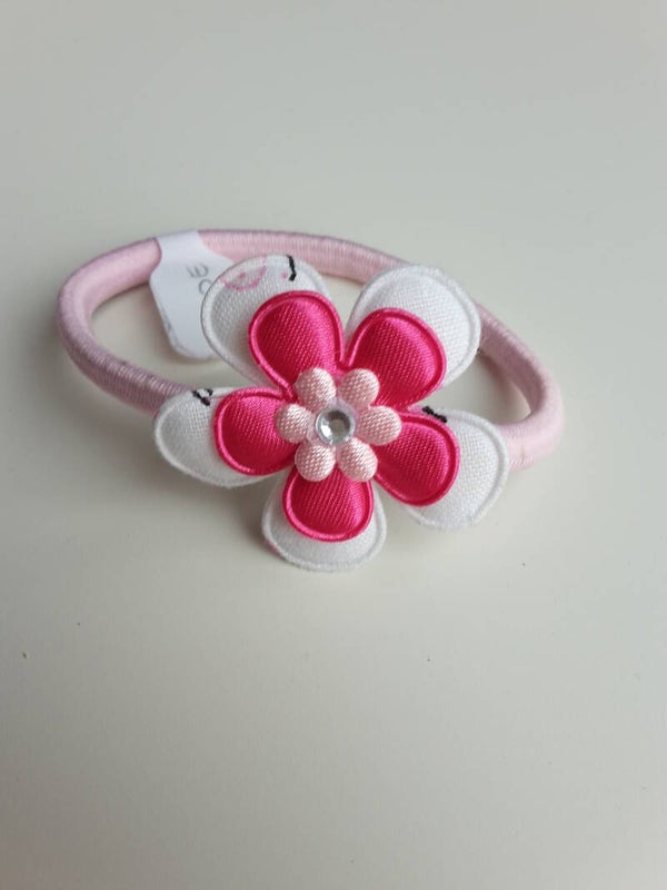Roze elastiek met bloem