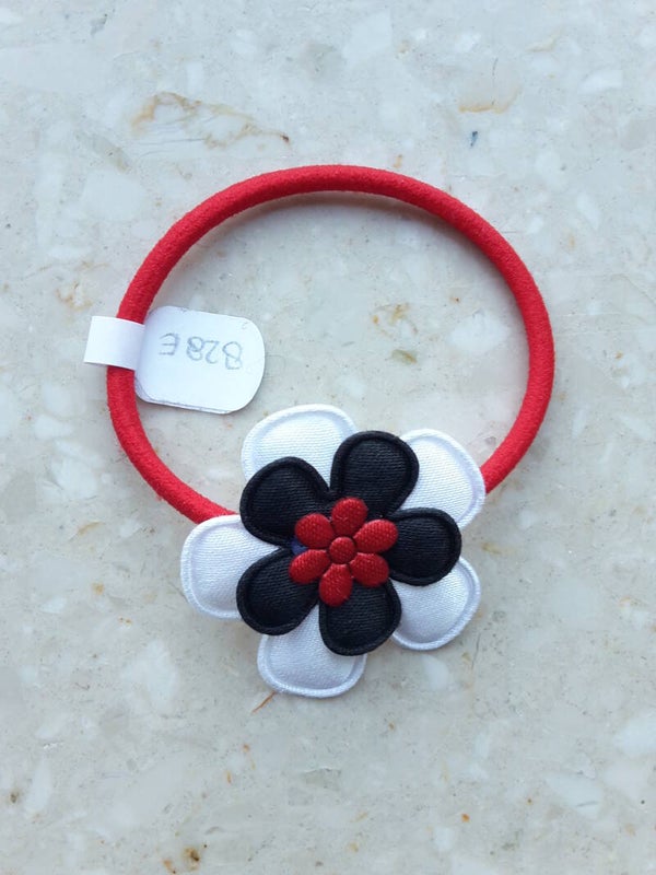 Rood elastiek met bloem