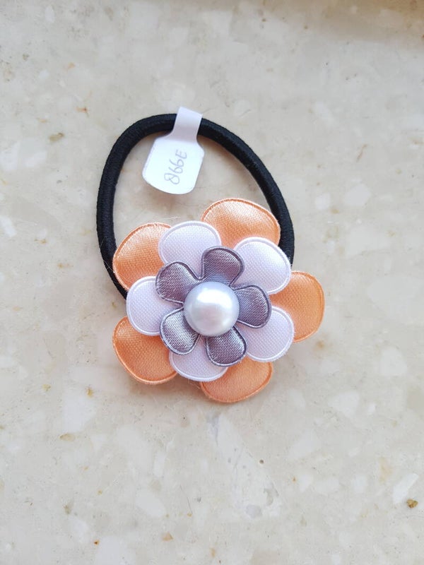 Zwart elastiek met bloem