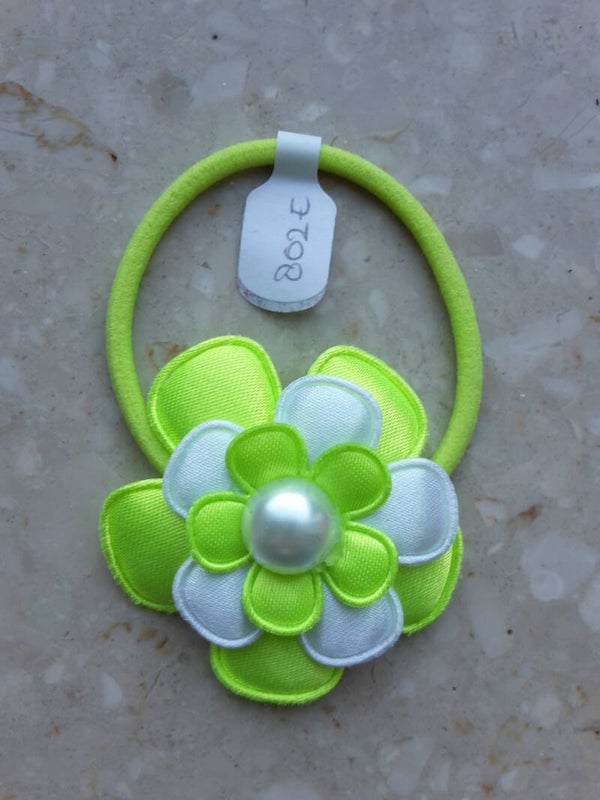 Neon geel elastiek met bloem