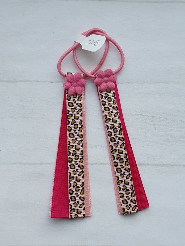 Roze elastiekjes met lintjes