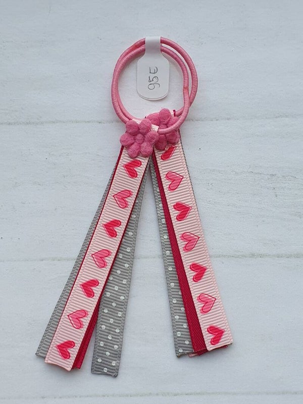 Roze elastiekjes met lintjes