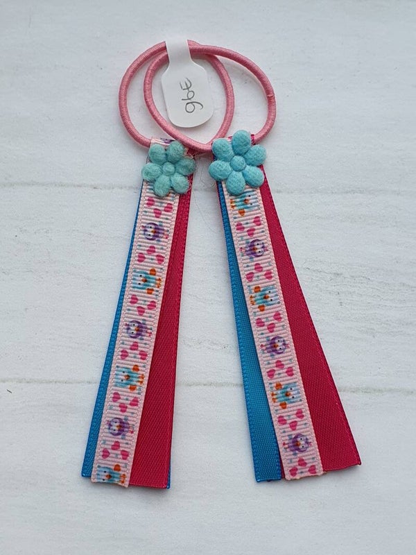 Roze elastiekjes met lintjes