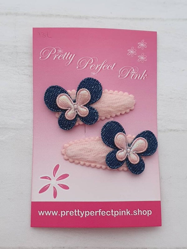 Roze haarspeldjes met vlindertjes
