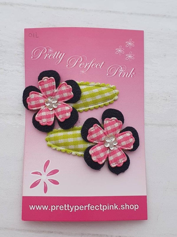 Groene haarspeldjes met bloemetjes