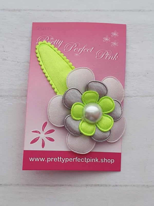 Neon gele haarspeld met bloem