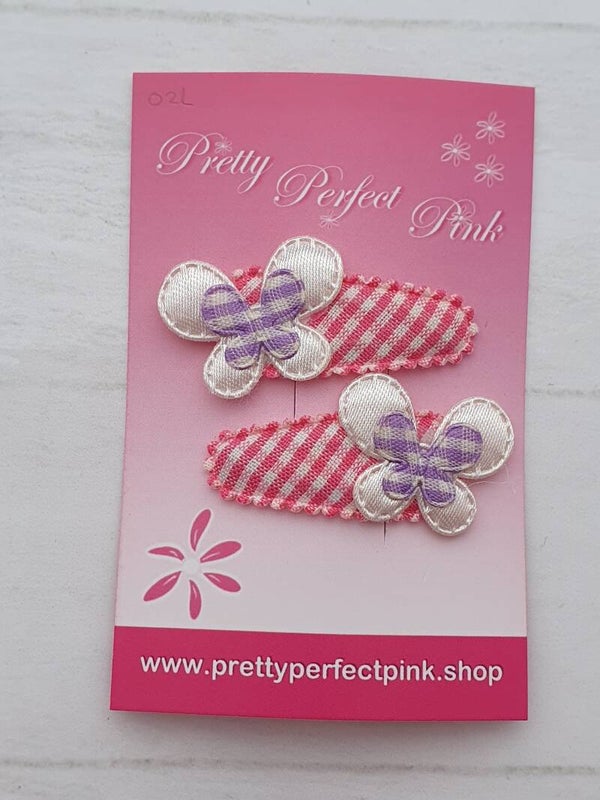 Roze haarspeldjes met vlindertjes