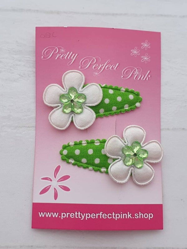 Groene haarspeldjes met bloemetjes