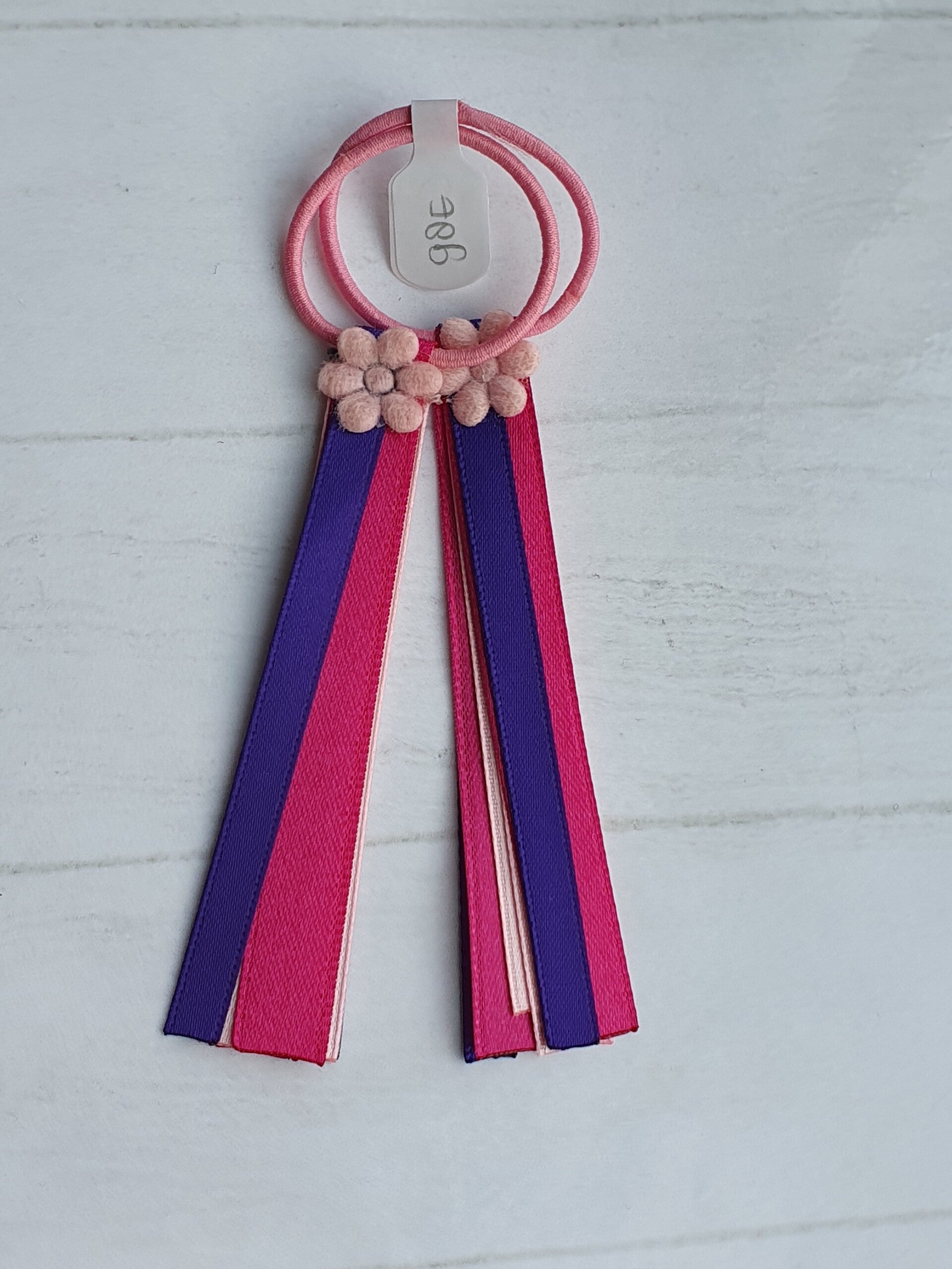 Roze elastiekjes met lintjes