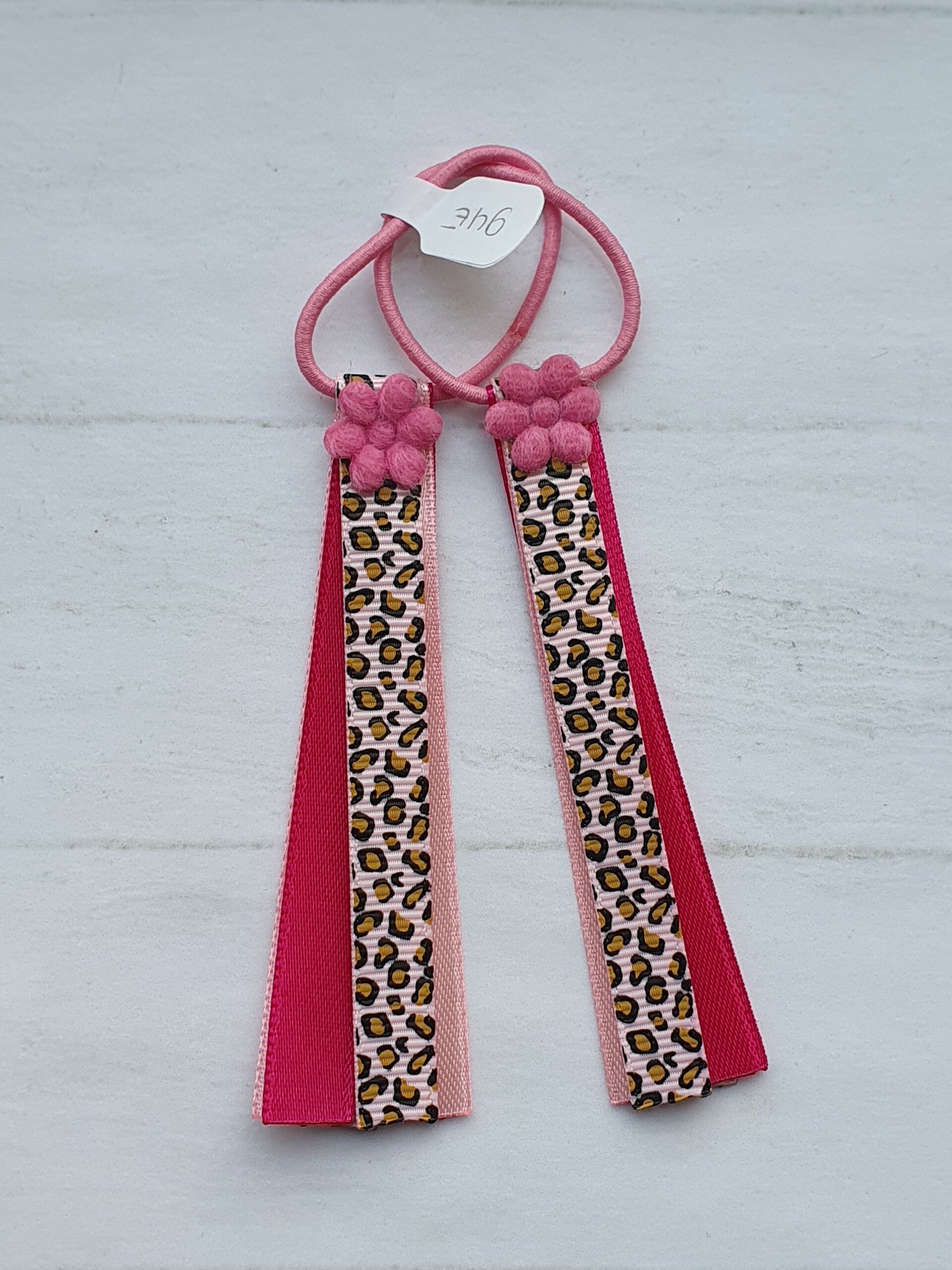 Roze elastiekjes met lintjes