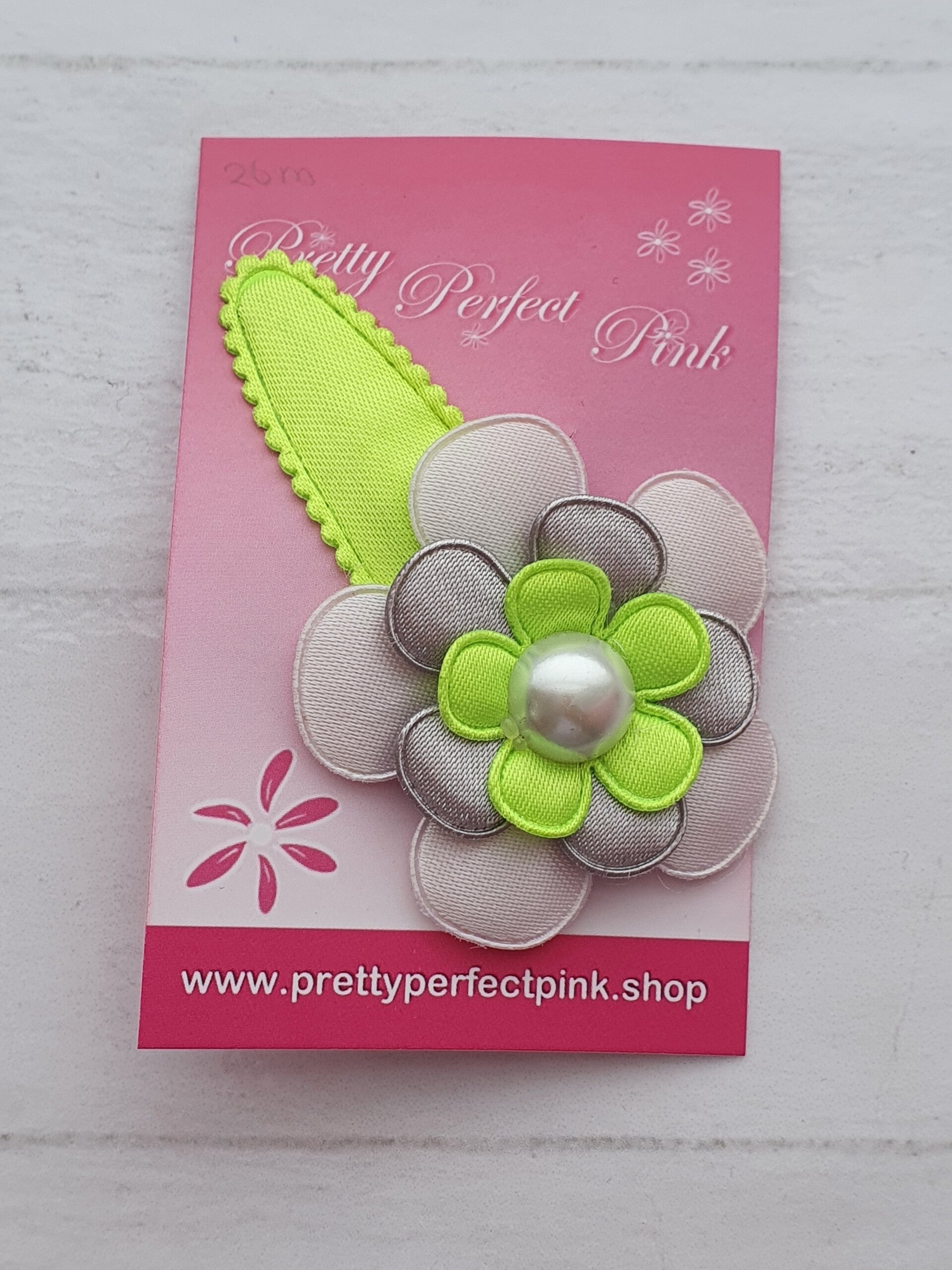 Neon gele haarspeld met bloem