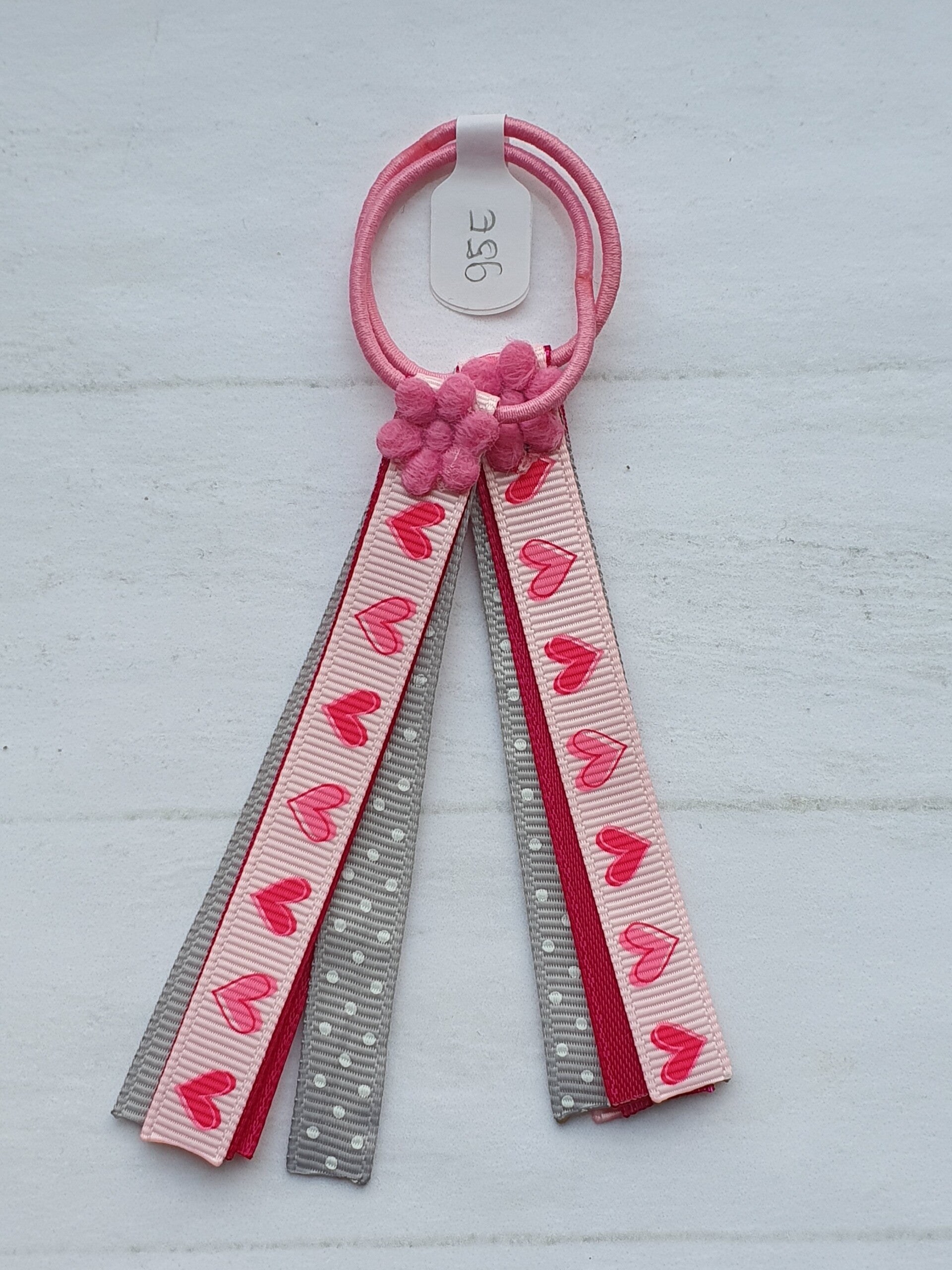 Roze elastiekjes met lintjes