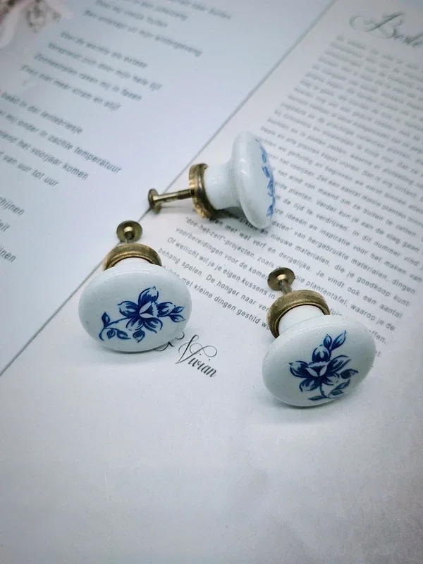 Set van porseleinen meubelgreepjes