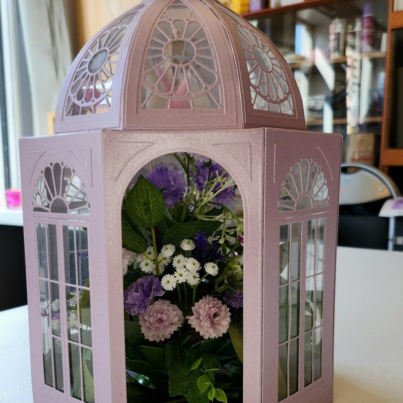 Terrarium with floral bouquet