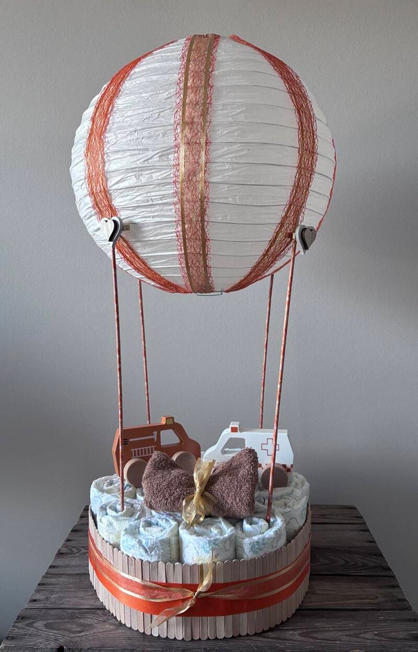 Pampertaart luchtballon, een uniek kraamcadeau. Enkel afhaalbaar in Staden of Langemark