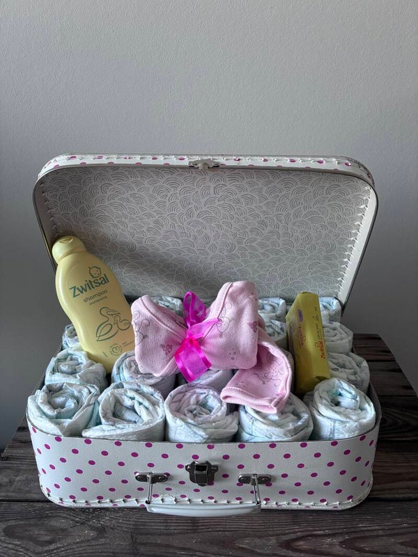 Roze gevuld valiesje, een blijvend geboortegeschenk