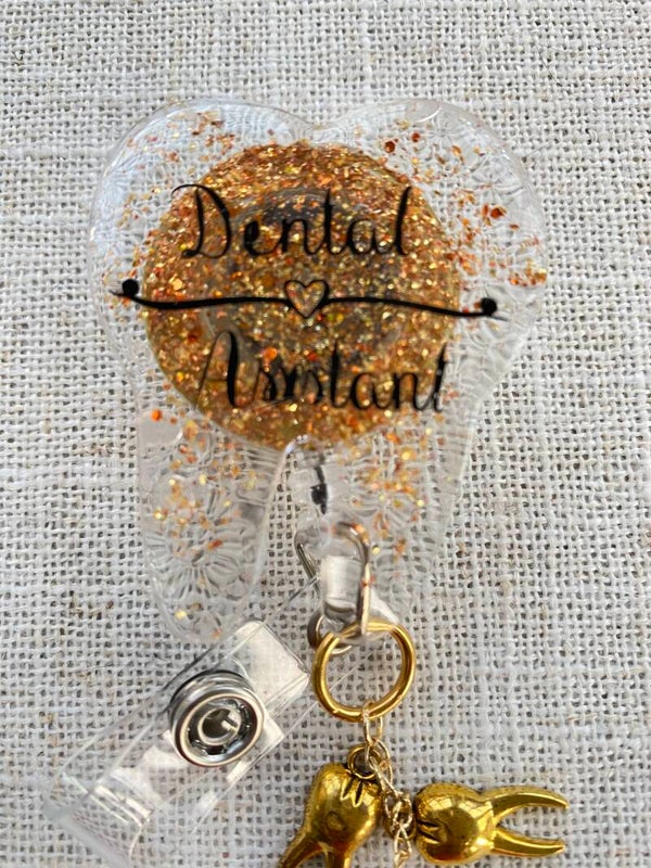 Gold glittery badge reel
