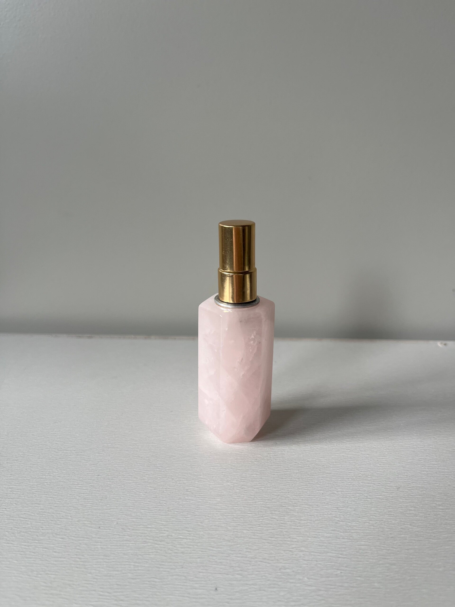 Rozenkwarts hexagonale parfumfles