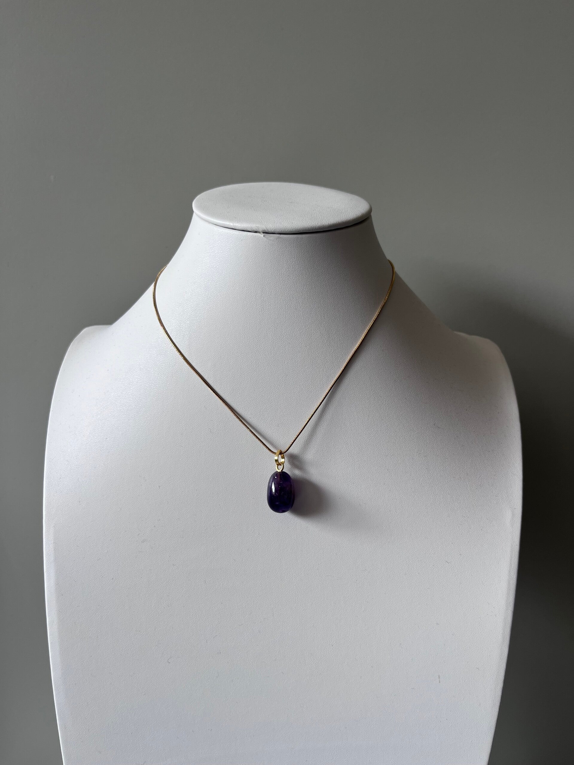 Goudkleurige Ketting met Amethist Hanger