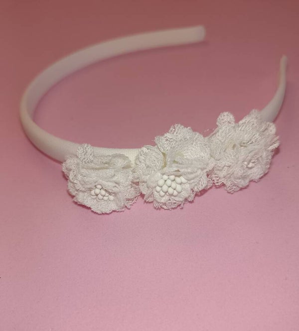 Cerchietto con fiori laterali