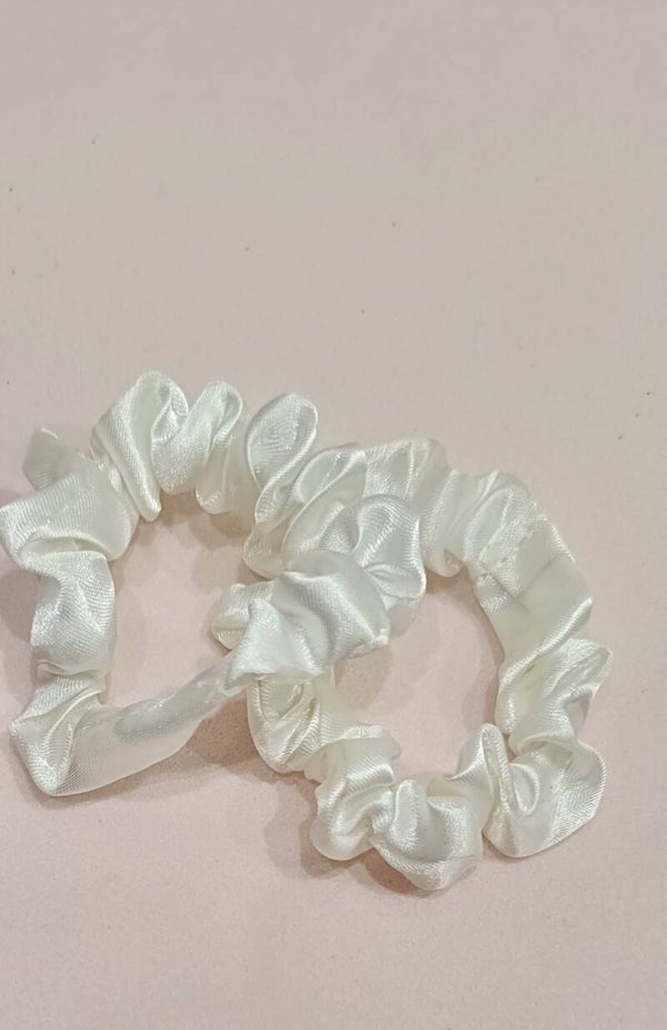 Elastici bianchi per capelli