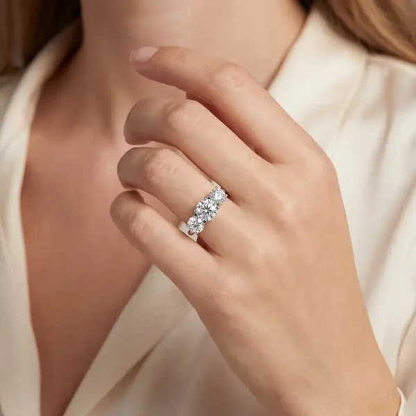 Round Diamond Trilogy Engagement Ring