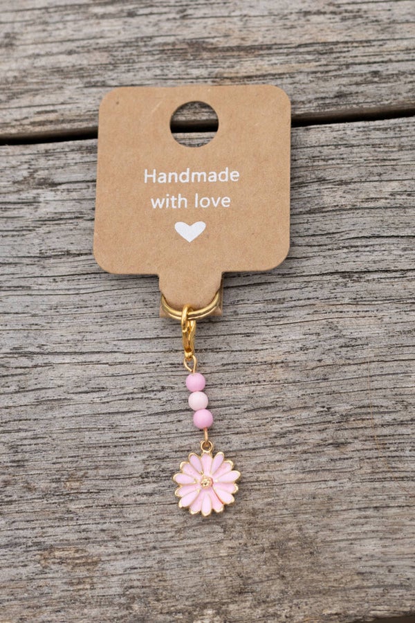 roze goud bloem met kralen