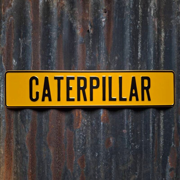 Caterpillar - Metalen nummerplaat geel