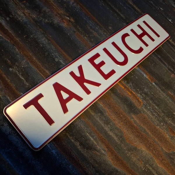 Takeuchi - Metalen nummerplat wit