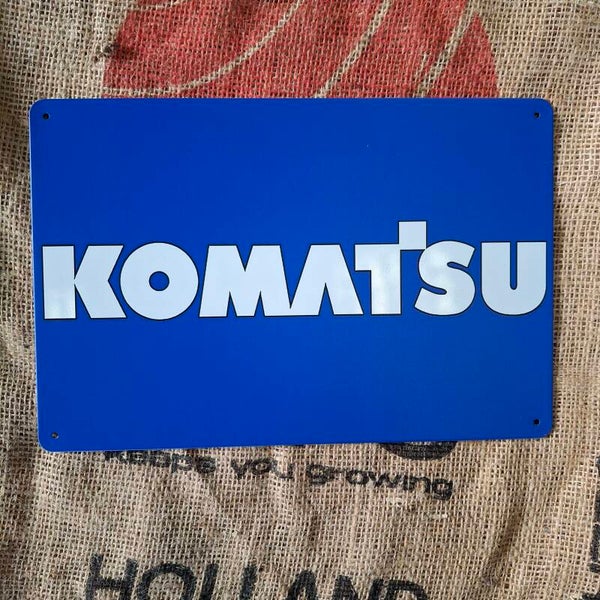 Komatsu - Metalen wandplaat