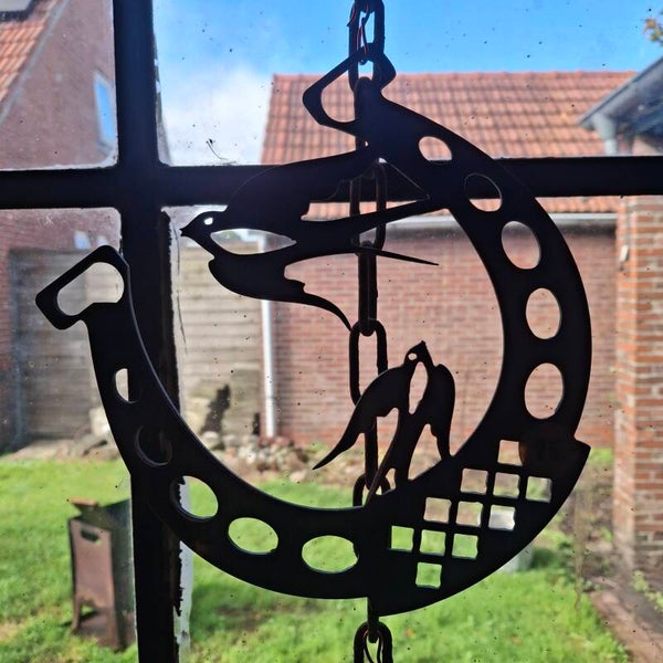 Zwaluwen in hoefijzer - Metalen snijwerk