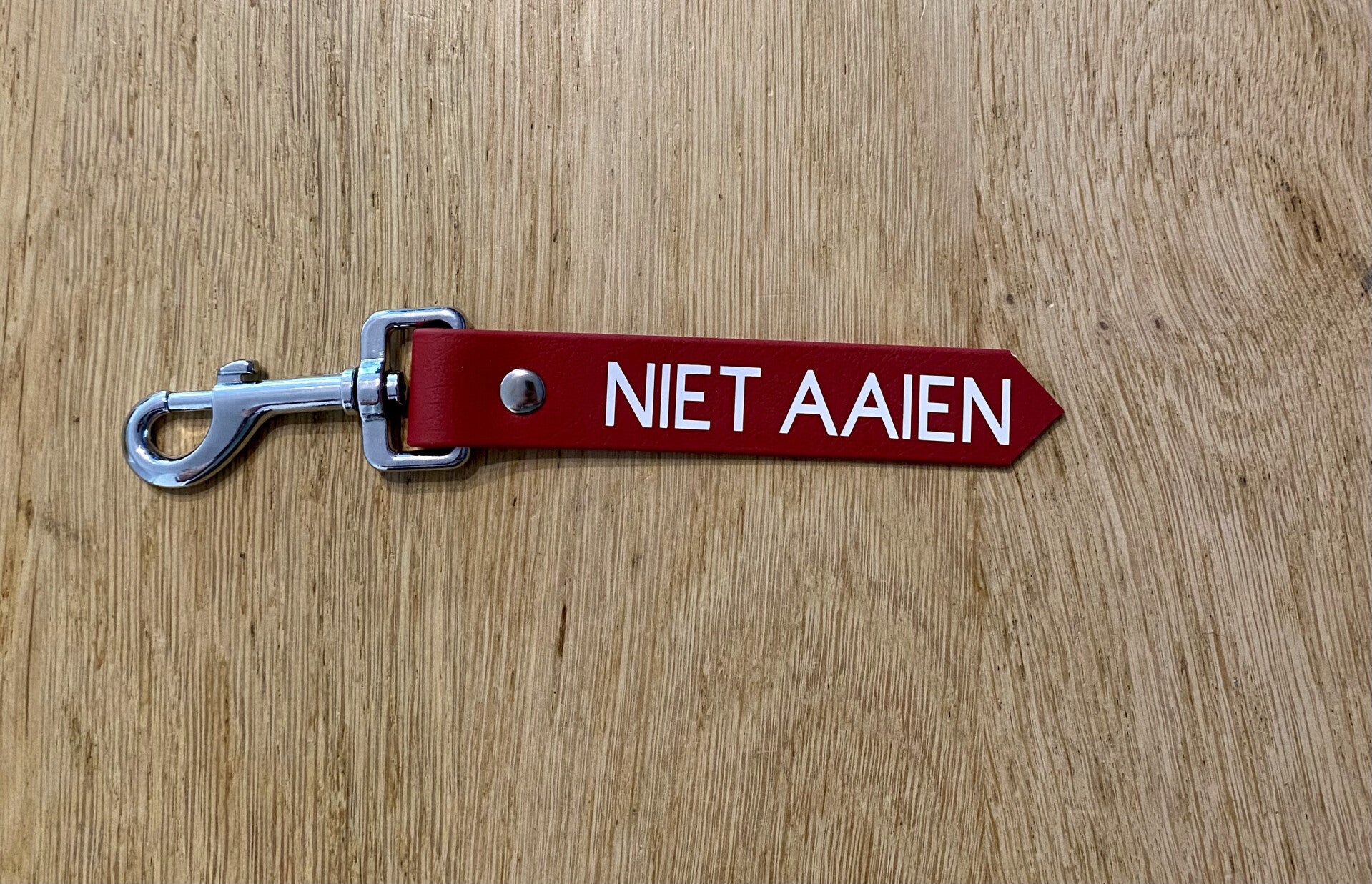 sleutelhanger niet aaien