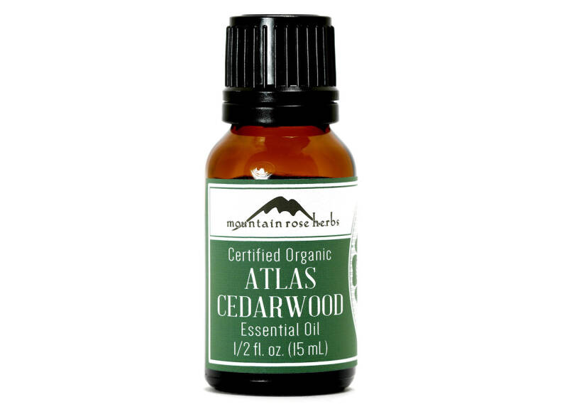 Mountain Rose Herbs Certified Organic Atlas Cedarwood Essential Oil bottle, grounding scent used in cozy holiday diffuser blends.