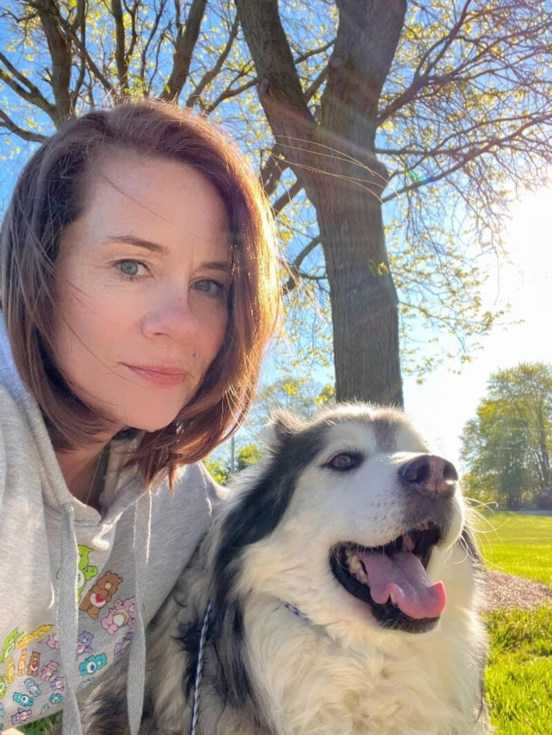 Crystal Manuel and her ESA dog Czar a senior Alaskan Malamute