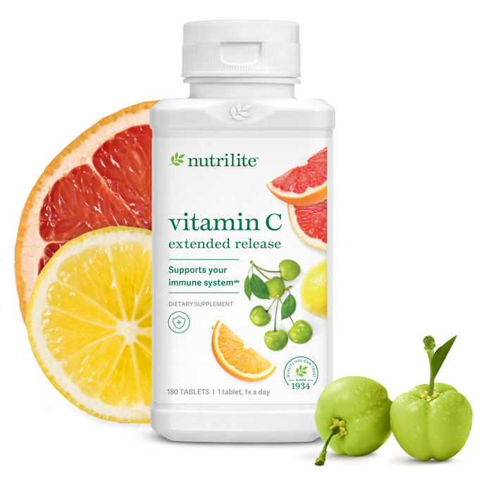 Nutrilite™ Vitamin C Extended Release bottle displayed with citrus fruits, supporting daily immune health.