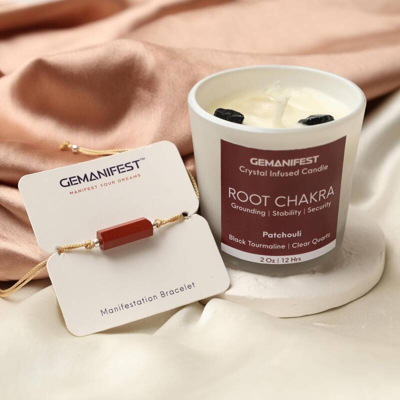 Root Chakra meditation candle with patchouli scent and red jasper energy bracelet, designed for grounding, protection, and spiritual healing rituals.