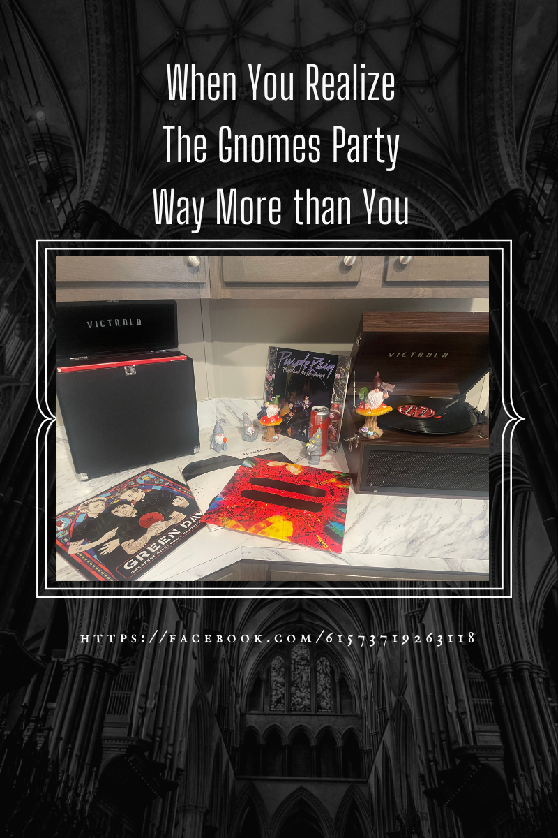 Several gnomes on the counter top and some on the record player. There are vinyl records scattered about.