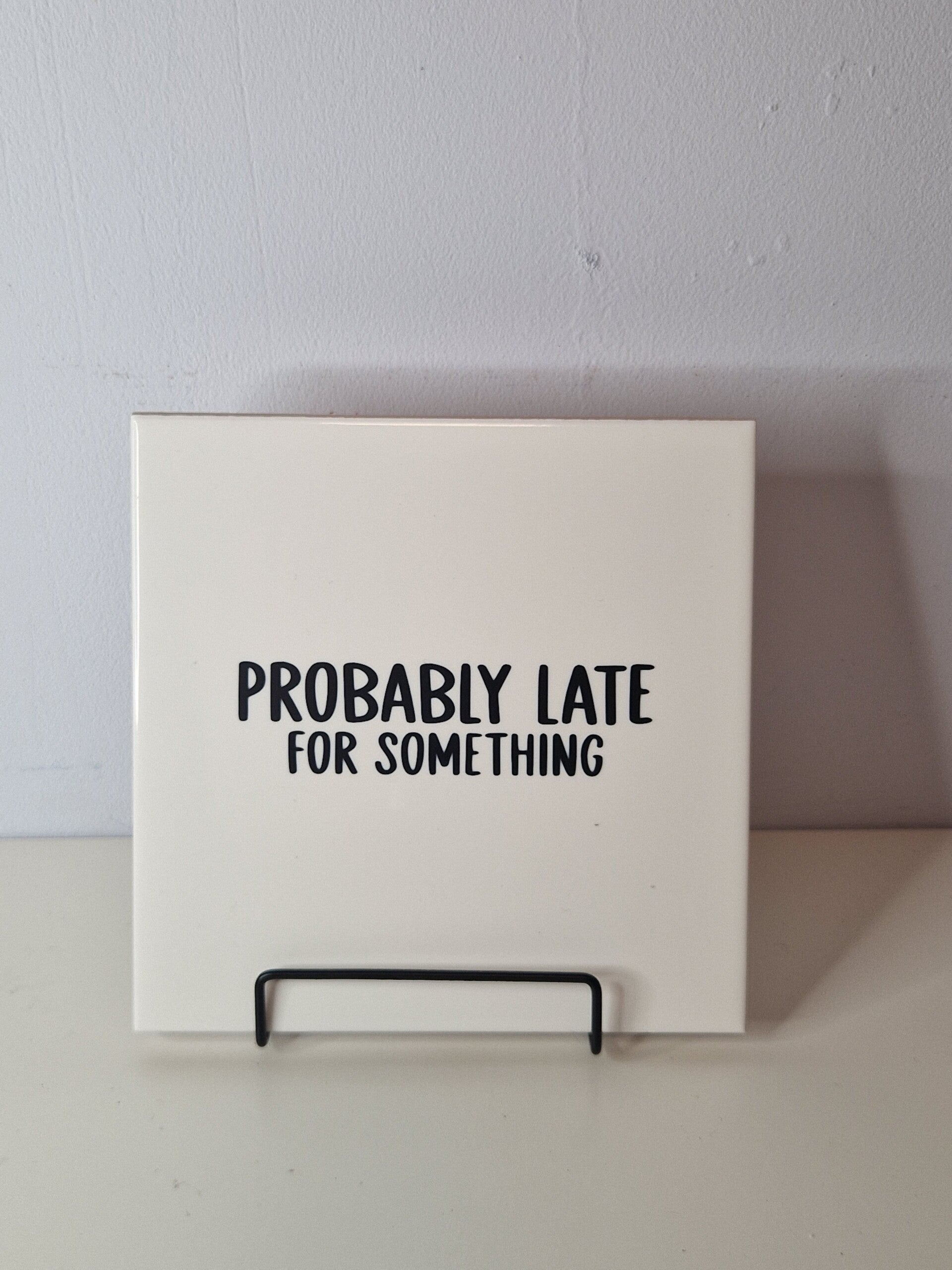 Probably late for something Tegeltje