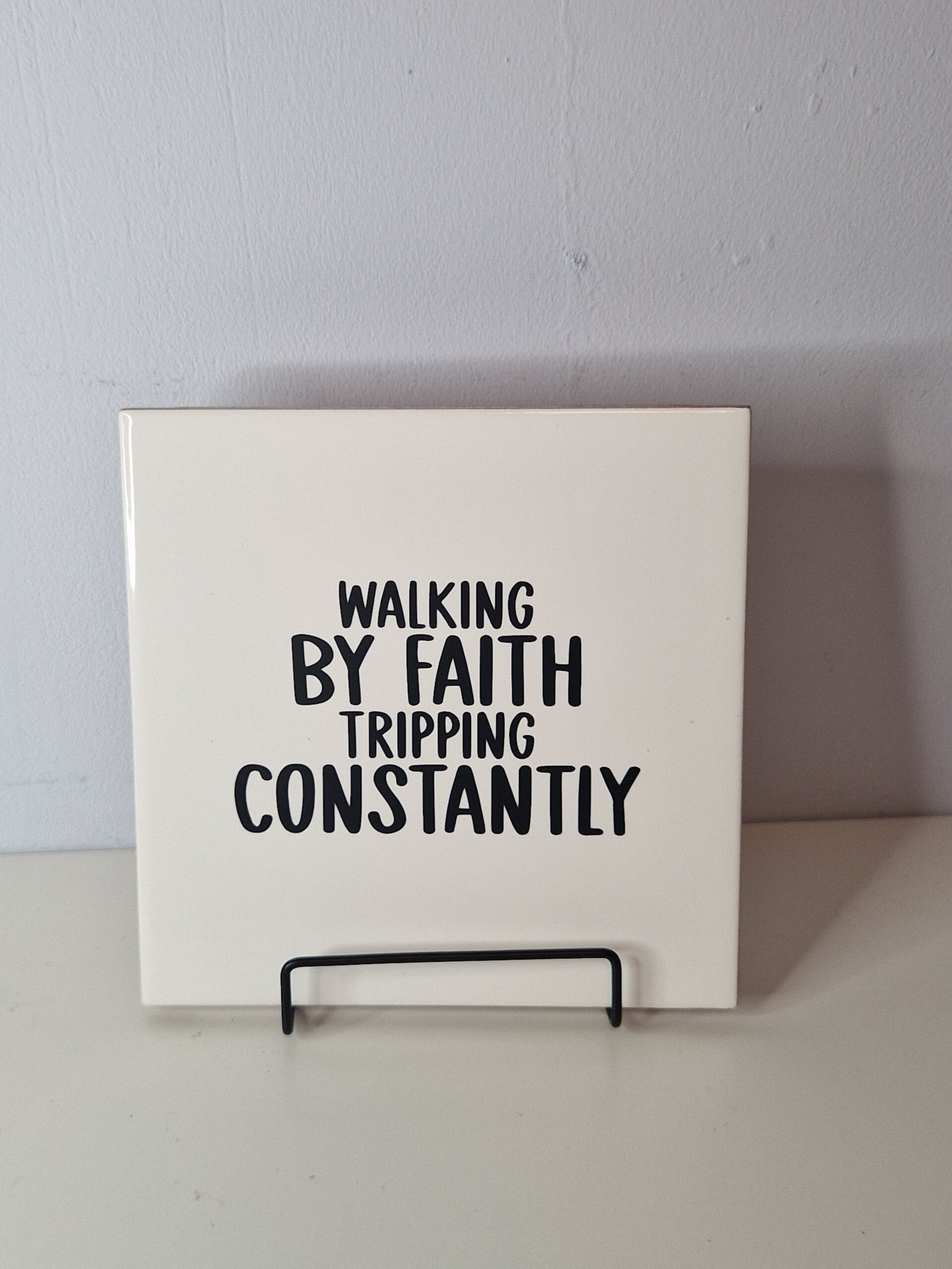 Walking by faith tripping constantly Tegeltje