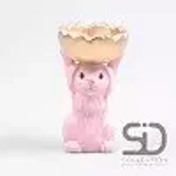 Haas met schaal 11x9.5x18cm roze