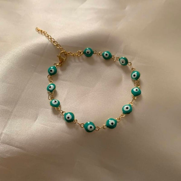 bracelet gold eyes blue