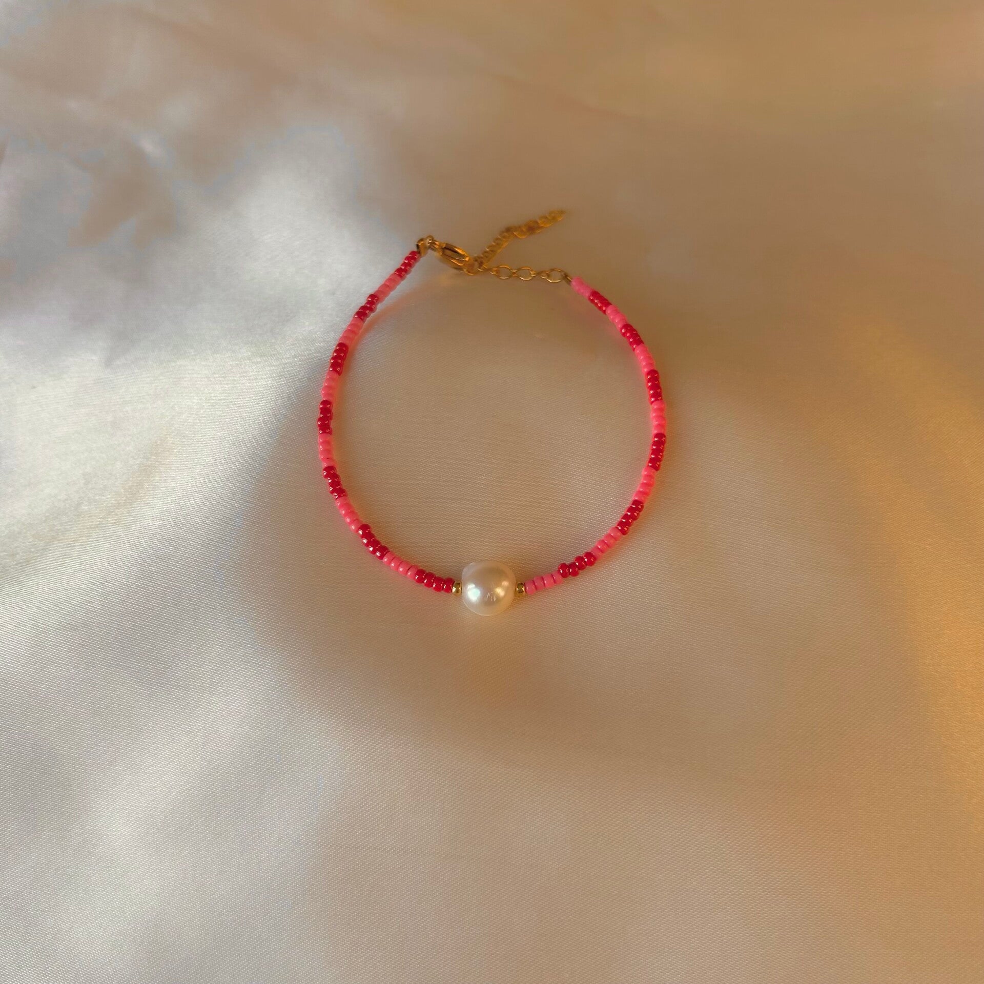 bracelet red pink pearl gold