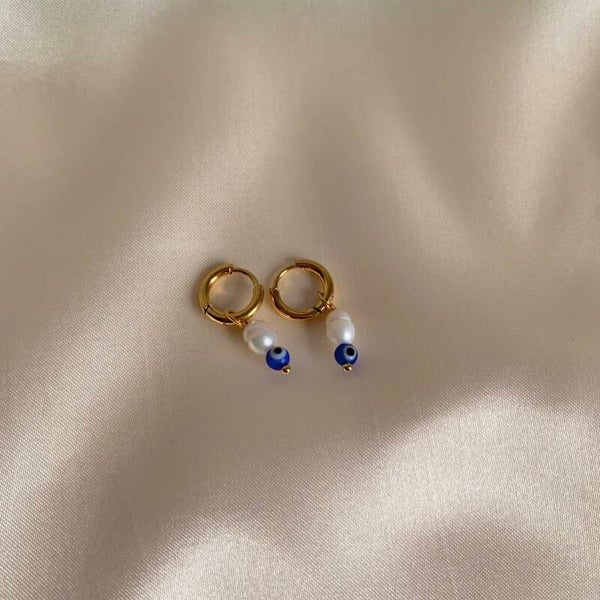 earrings pearls eyes